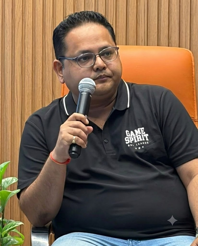 Subhankar Dey holding a microphone during a conversation